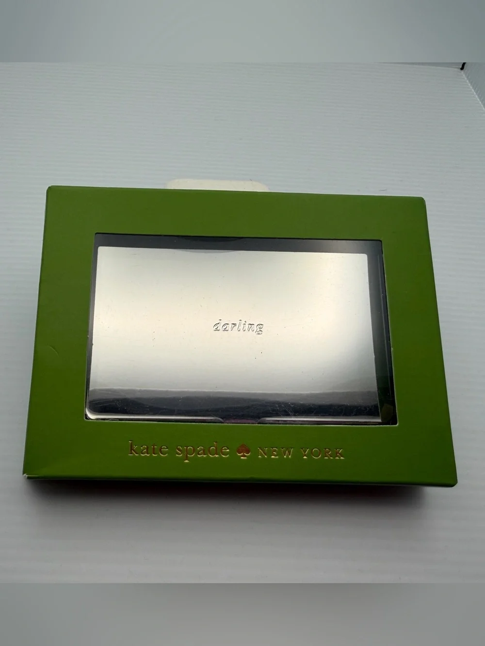 kate spade silver “darling” metal card case